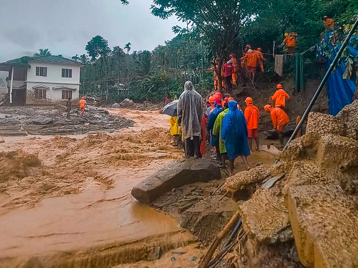 PTI : National Disaster Response Force (NDRF) personnel conduct rescue operation after huge landslides in the hilly areas near Meppadi, in Wayanad district, Kerala, Tuesday, July 30
